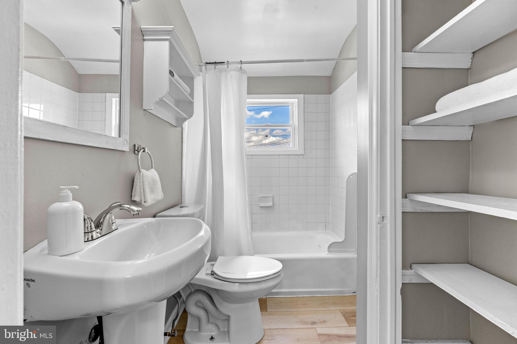 8450 Kavanagh Road Dundalk, MD 21222 - Photo 25 of 32 a bathroom with a sink toilet and shower
