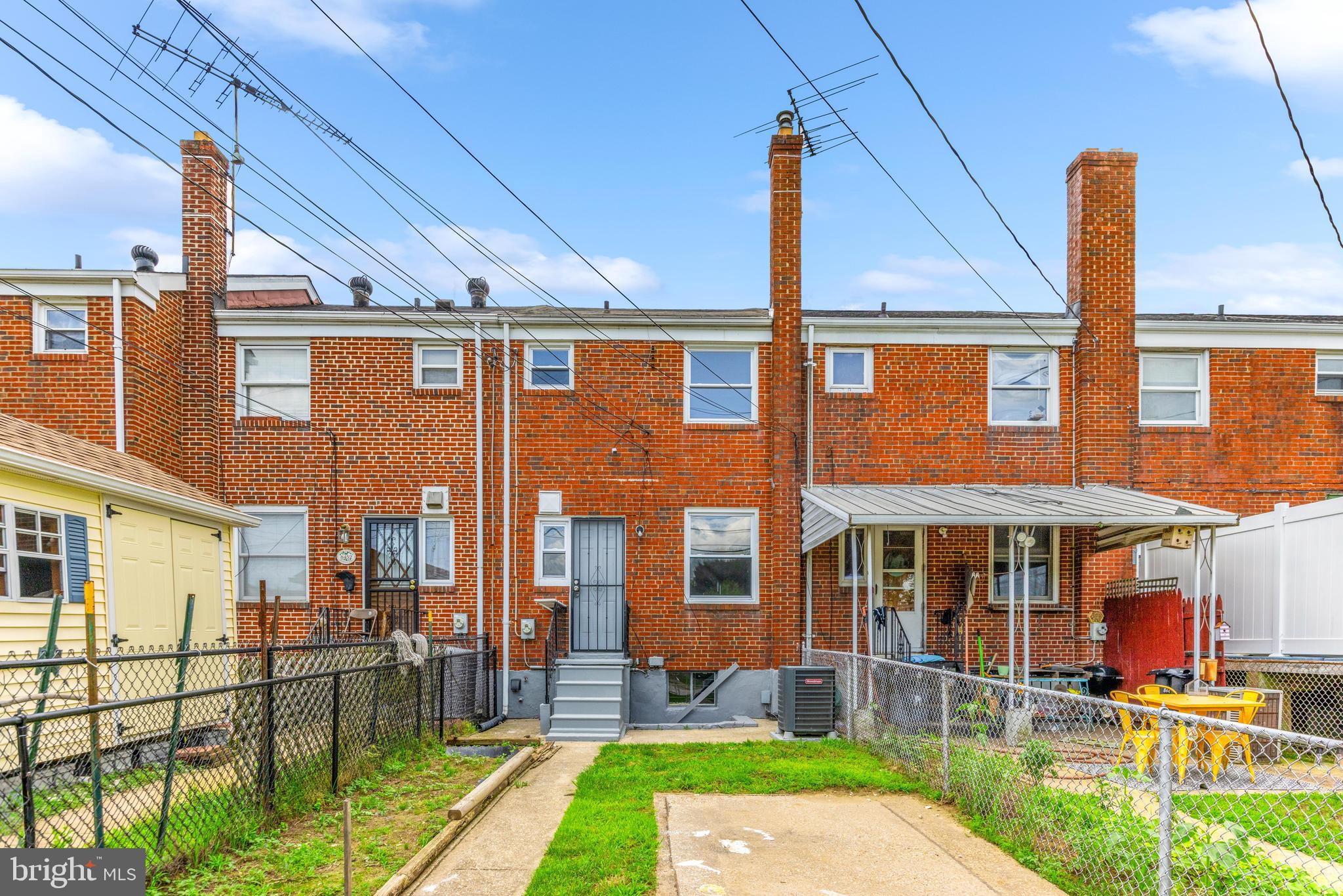 8450 Kavanagh Road Dundalk, MD 21222 - Photo 32 of 32 a patio with sofas table and chairs