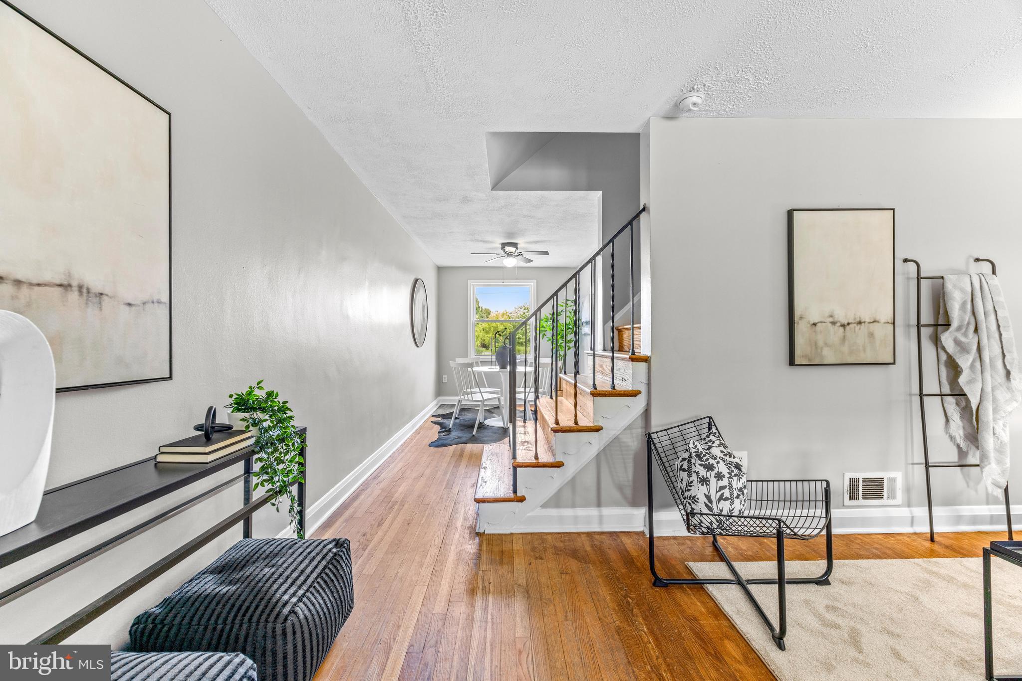 8450 Kavanagh Road Dundalk, MD 21222 - Photo 5 of 32 a living room with furniture and wooden floor