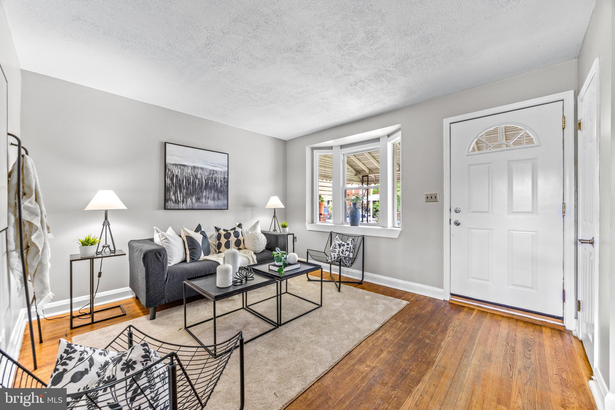 8450 Kavanagh Road Dundalk, MD 21222 - Photo 6 of 32 a living room with furniture and a window