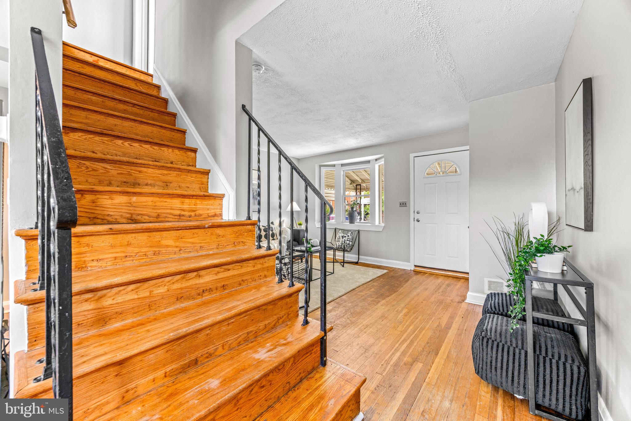 8450 Kavanagh Road Dundalk, MD 21222 - Photo 8 of 32 a view of entryway and hall with wooden floor