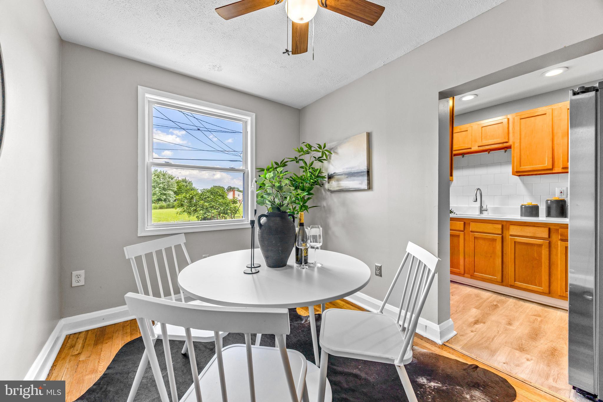 8450 Kavanagh Road Dundalk, MD 21222 - Photo 9 of 32 a dining room with furniture and window