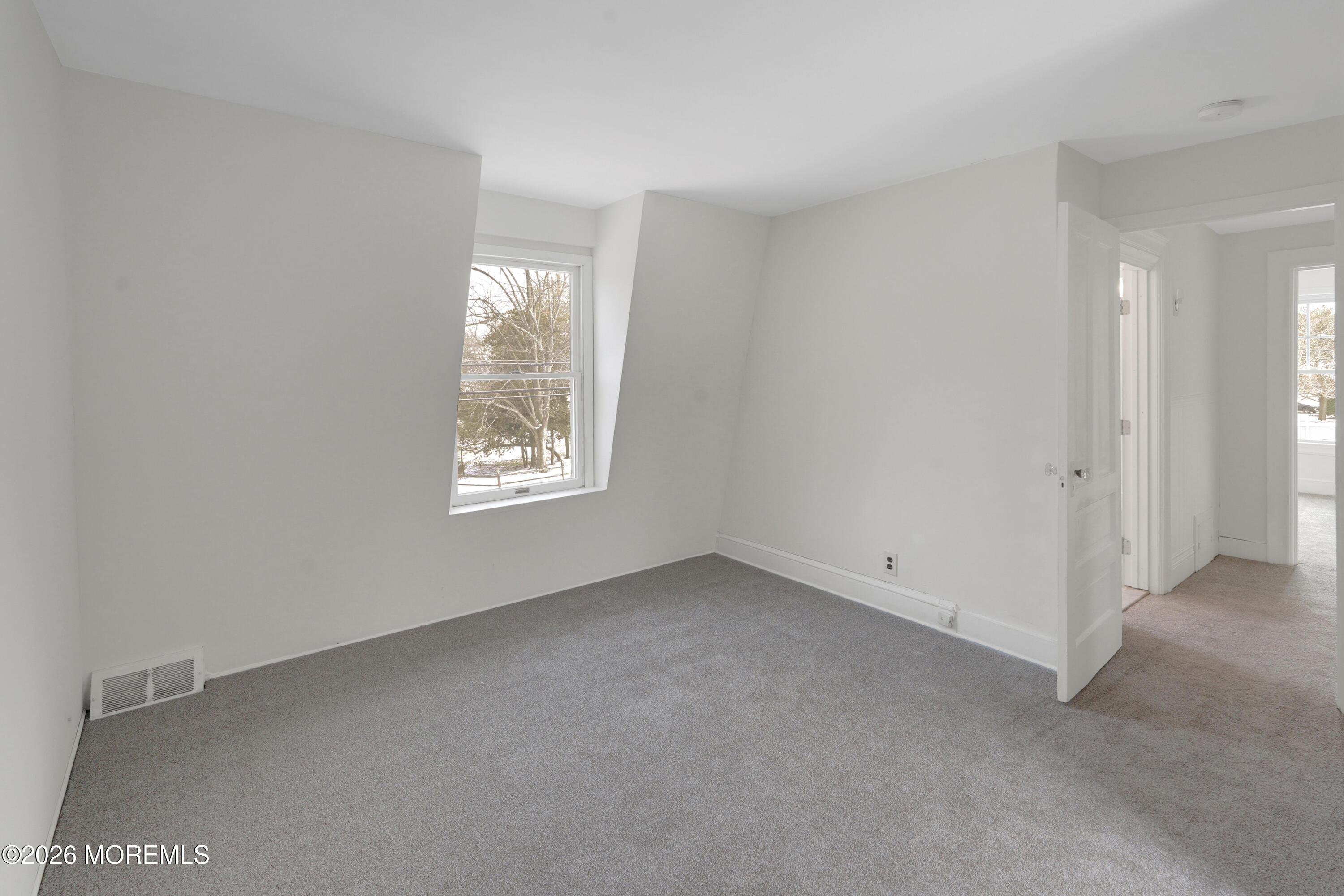 1527 Marconi Road Wall, NJ 07719 - Photo 12 of 25 a view of an empty room with a window