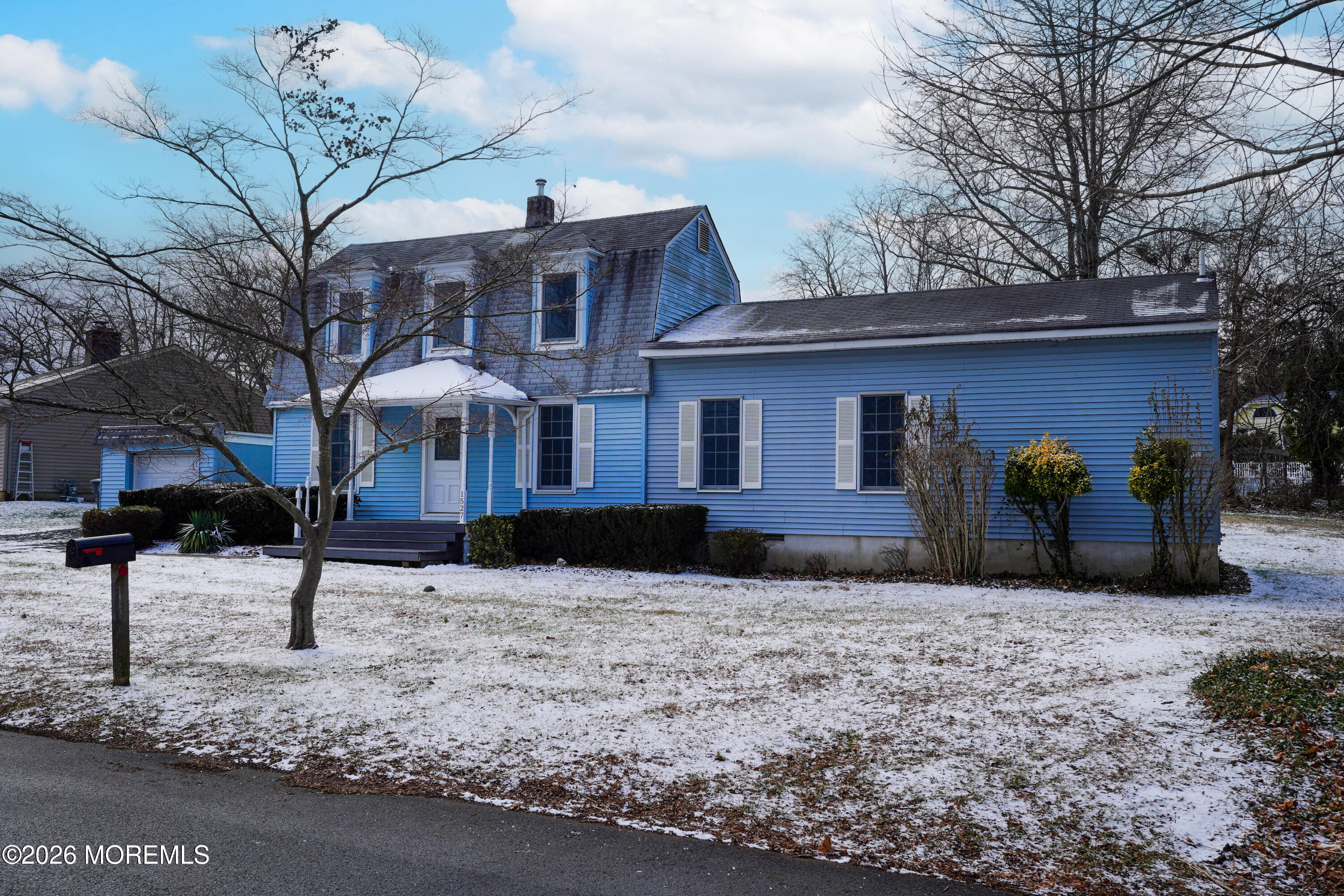 1527 Marconi Road Wall, NJ 07719 - Photo 2 of 25 a view of a house with a yard covered in snow