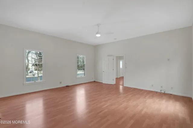 a bathroom with a toilet sink and shower
