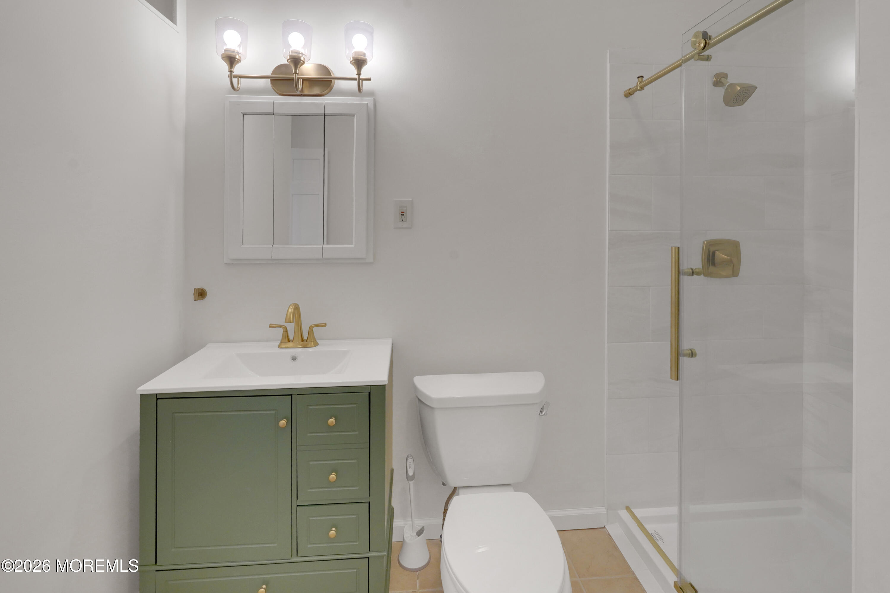 1527 Marconi Road Wall, NJ 07719 - Photo 22 of 25 a bathroom with a toilet sink and shower