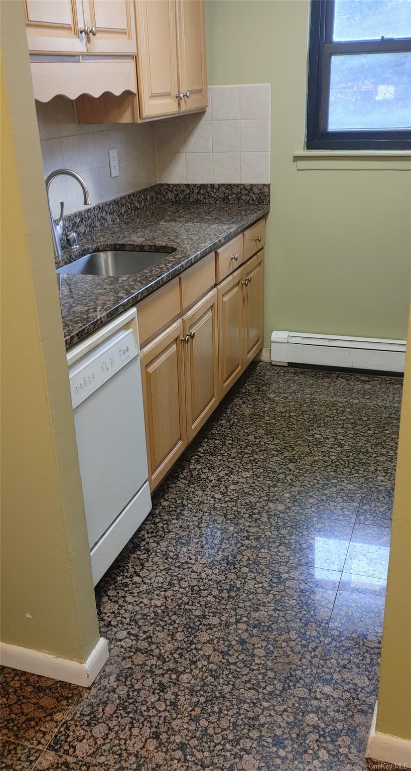 106 Union Road, Unit 3J Spring Valley, NY 10977 - Photo 1 of 11 a kitchen with a sink and cabinets