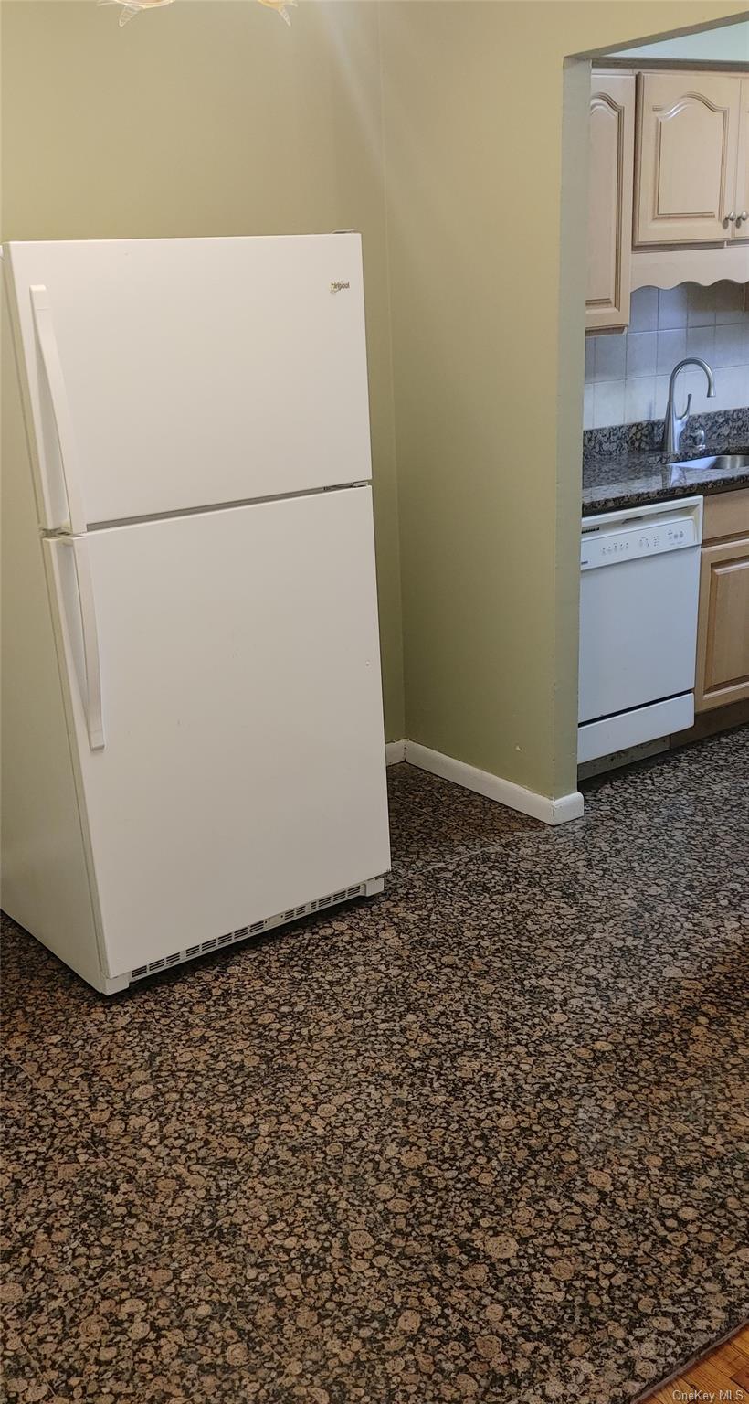 106 Union Road, Unit 3J Spring Valley, NY 10977 - Photo 2 of 11 a white refrigerator freezer sitting in a kitchen