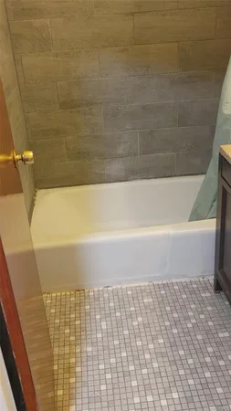 a bathroom with a bathtub