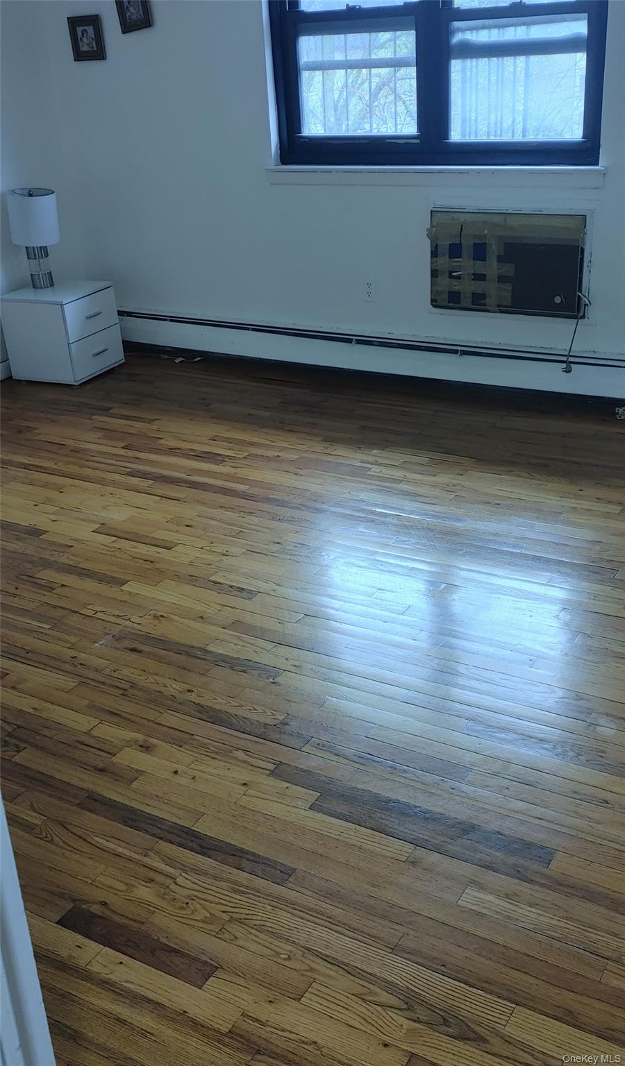 106 Union Road, Unit 3J Spring Valley, NY 10977 - Photo 6 of 11 a view of room and wooden floor