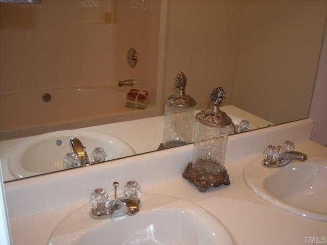 1731 Grace Brook Road Raleigh, NC 27609 - Photo 5 of 11 a bathroom with a sink