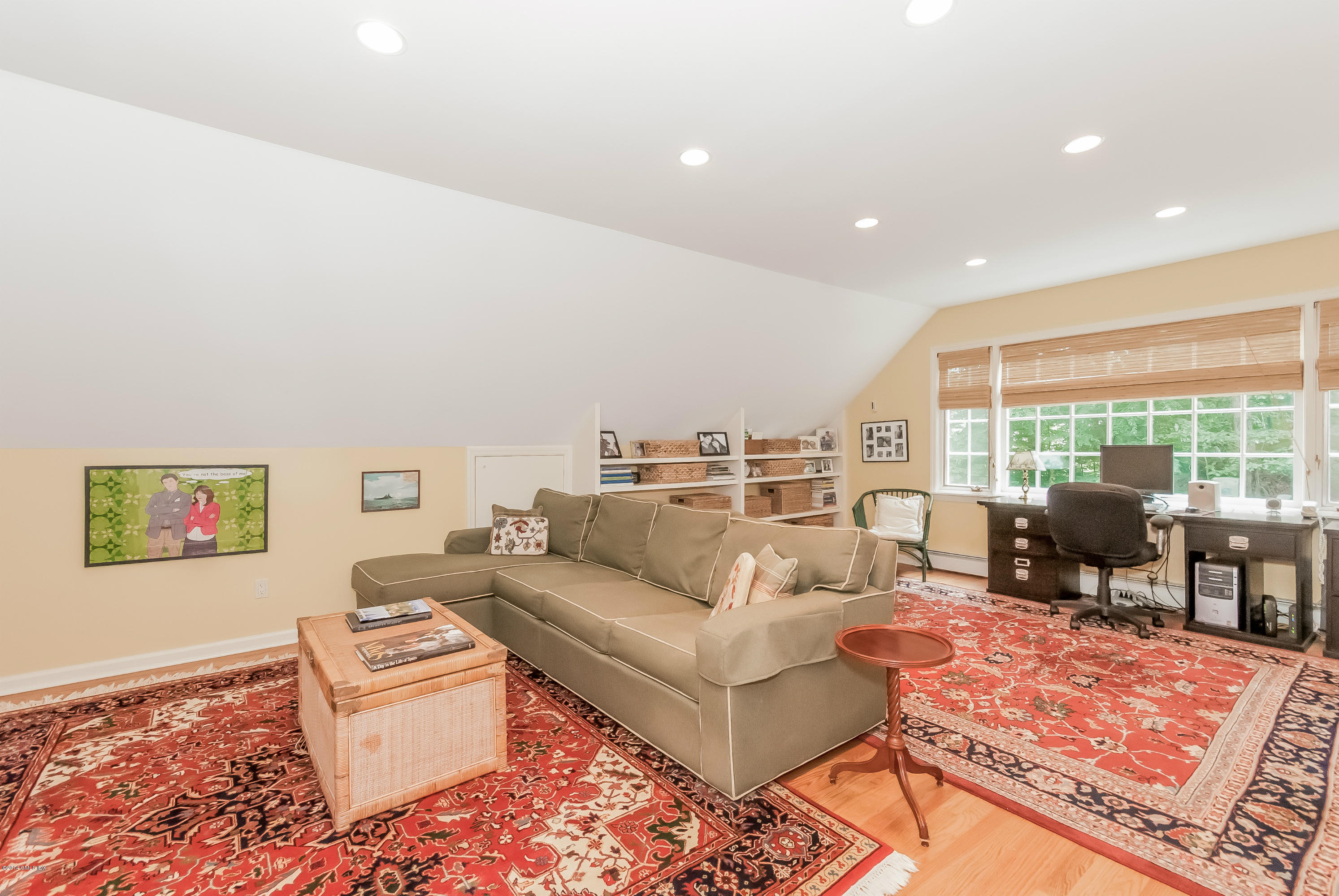 45 Old Stone Bridge Road Cos Cob, CT 06807 - Photo 19 of 35 a living room with furniture a rug and a floor to ceiling window
