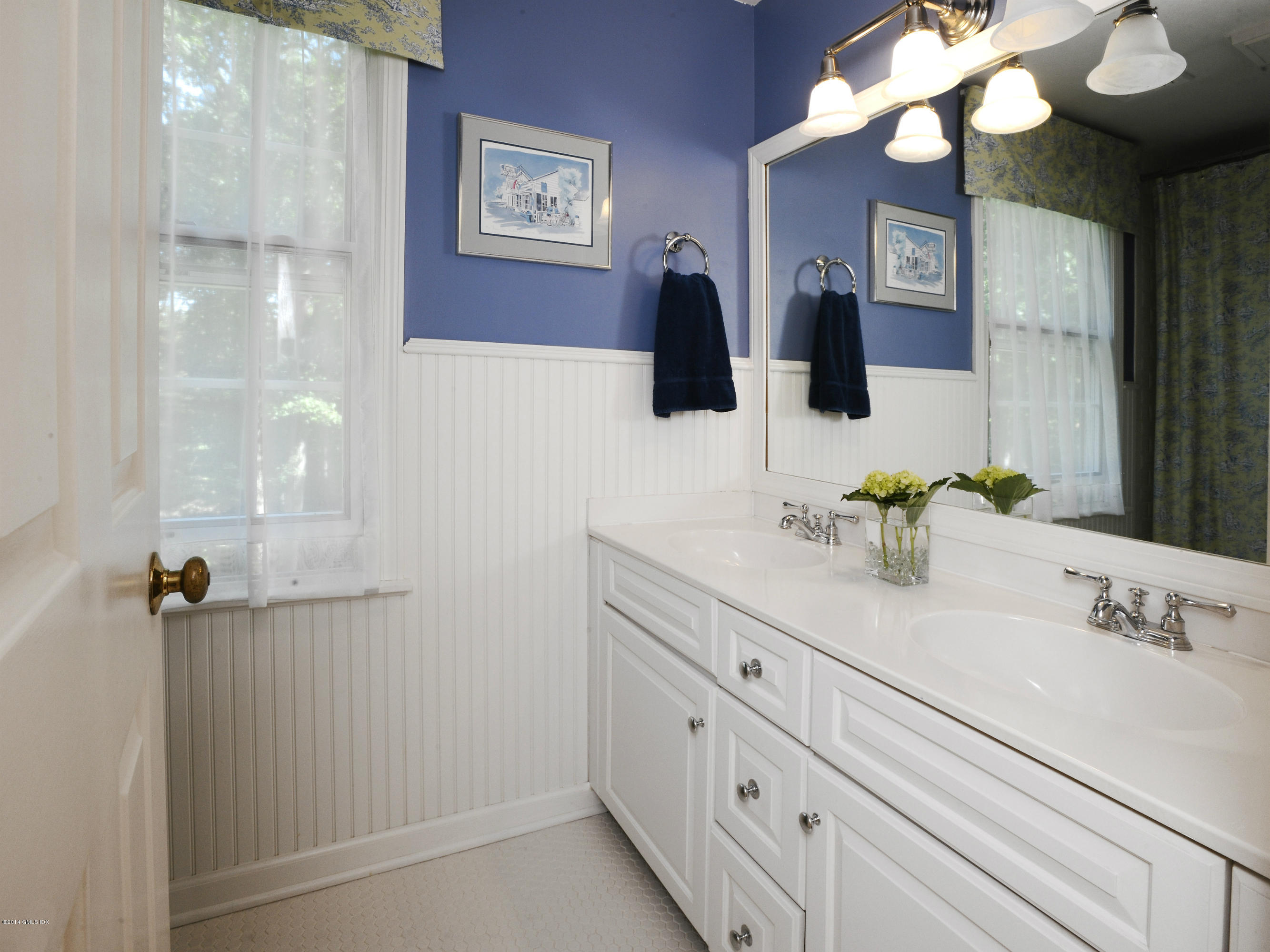 45 Old Stone Bridge Road Cos Cob, CT 06807 - Photo 20 of 35 a bathroom with a sink vanity and mirror