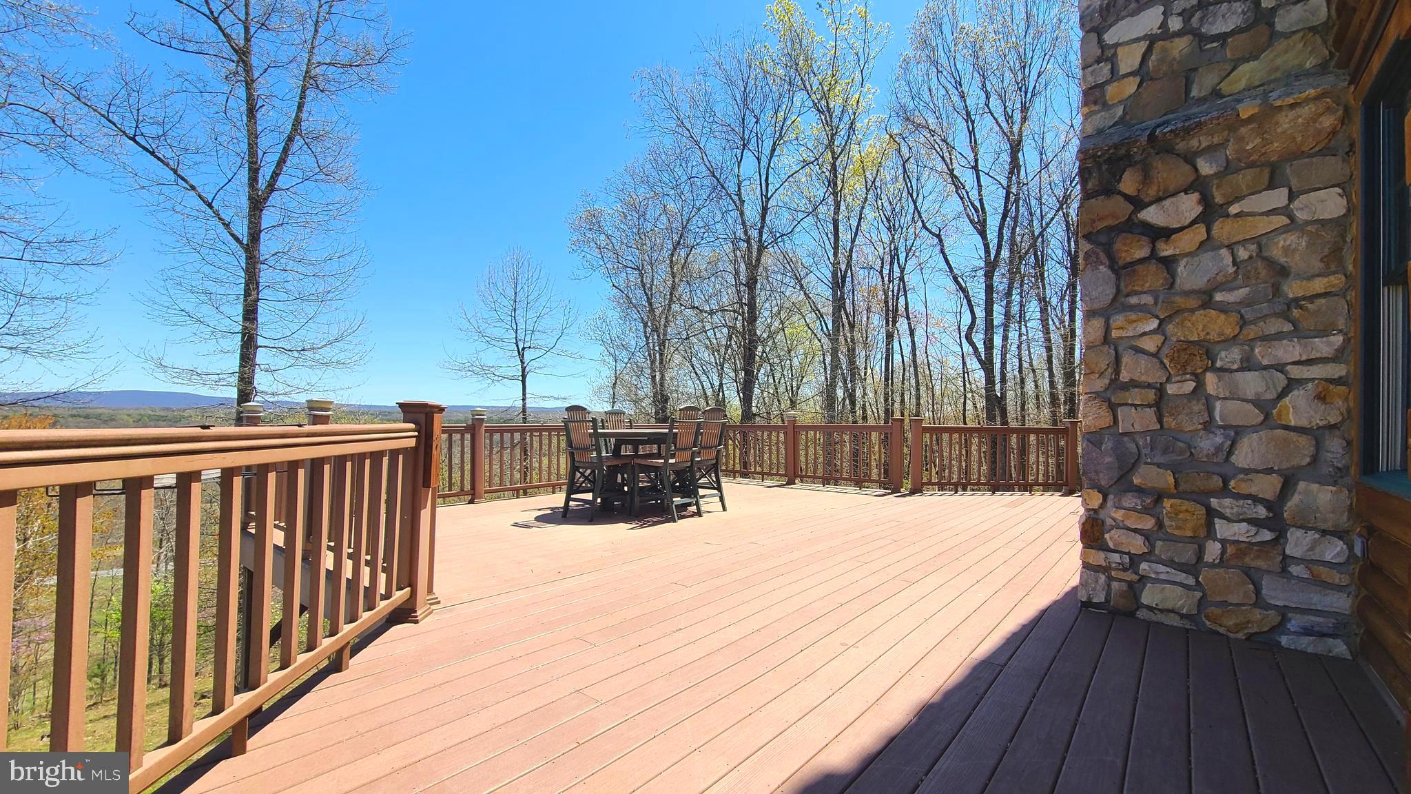 11600 Valley Road Berkeley Springs, WV 25411 - Photo 24 of 113 Massive trex deck n beautiful stone on chimney
