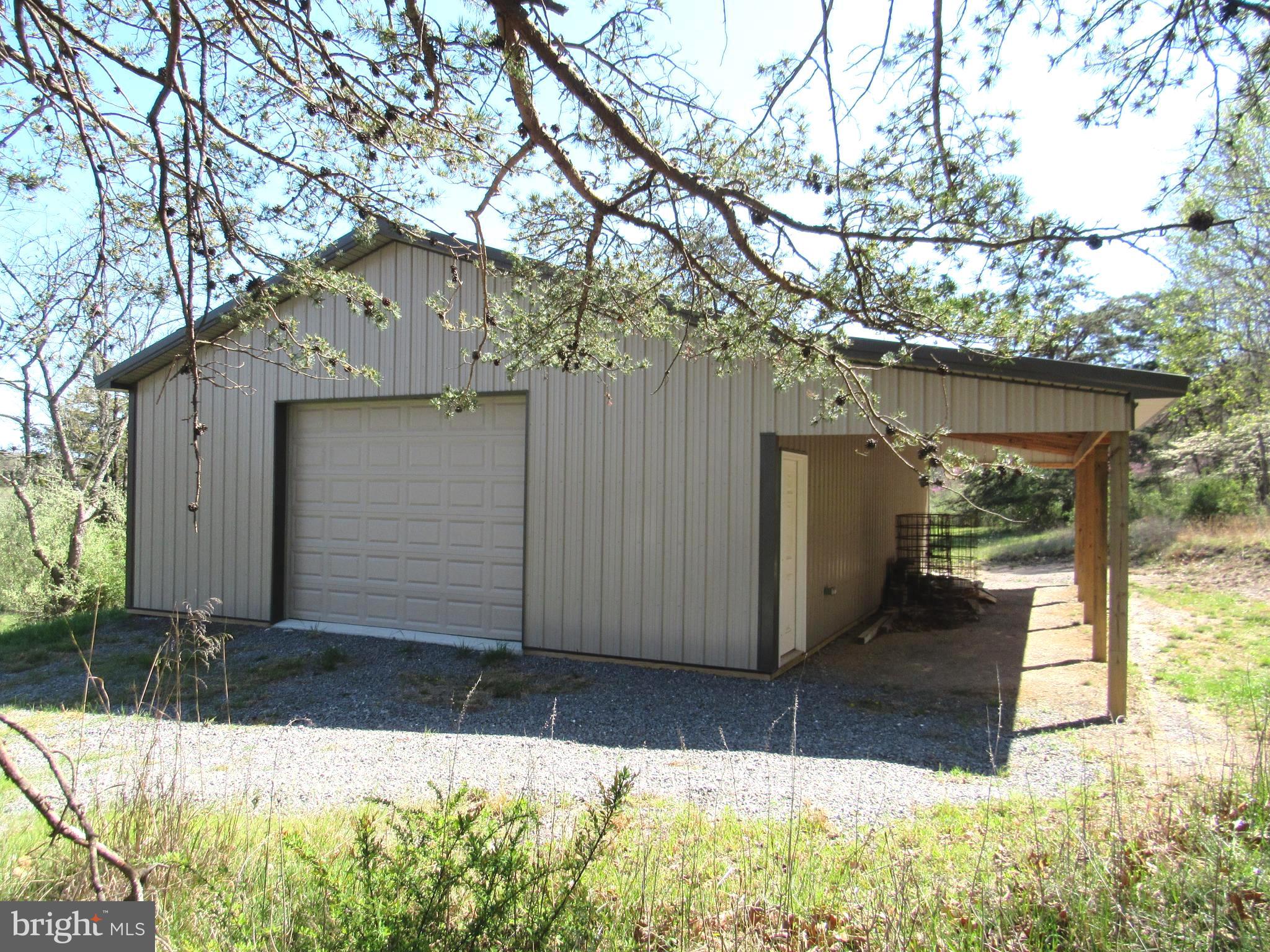 11600 Valley Road Berkeley Springs, WV 25411 - Photo 30 of 113 Lower Field is your 40x30 pole barn w/electric