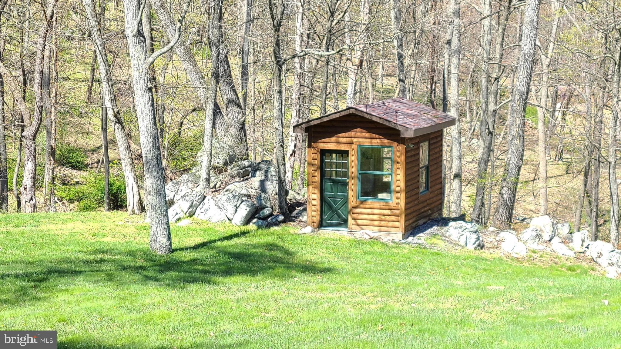 11600 Valley Road Berkeley Springs, WV 25411 - Photo 33 of 113 Cozy little hunting cabin, is adorable.