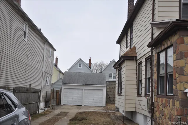 a view of a house with a parking space