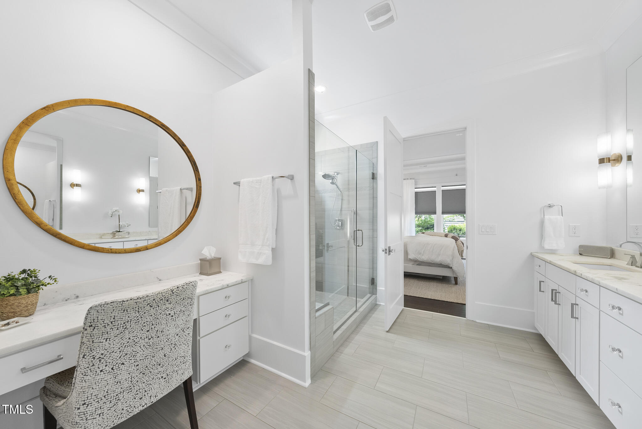 129 Damsire Way Cary, NC 27513 - Photo 18 of 33 a en suite bathroom with a granite countertop tub sink and mirror