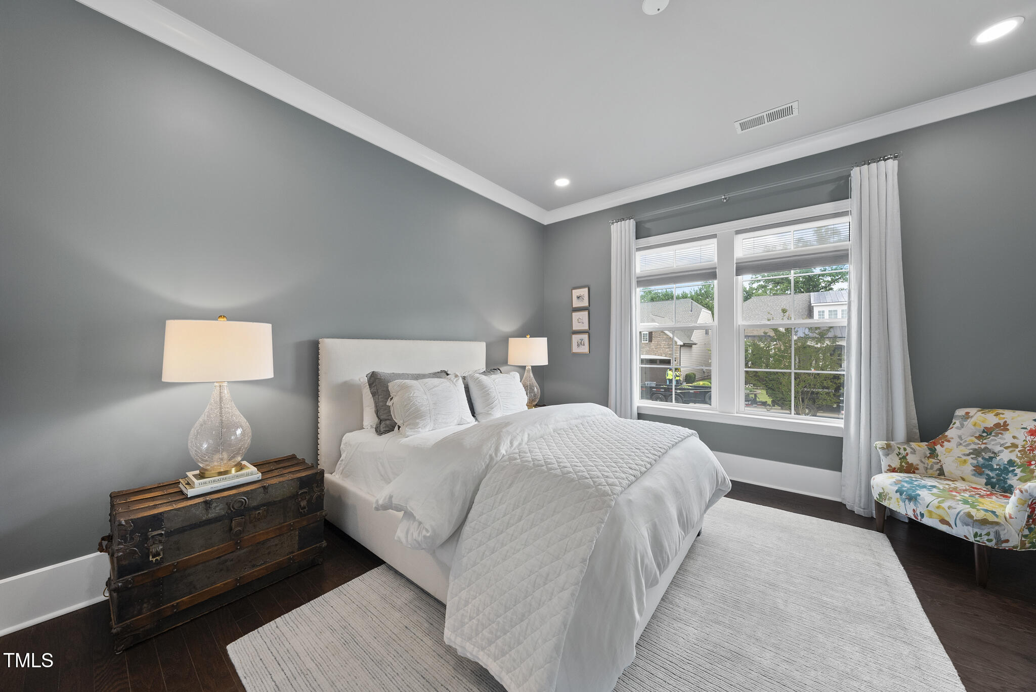 129 Damsire Way Cary, NC 27513 - Photo 21 of 33 a bedroom with a bed and a window