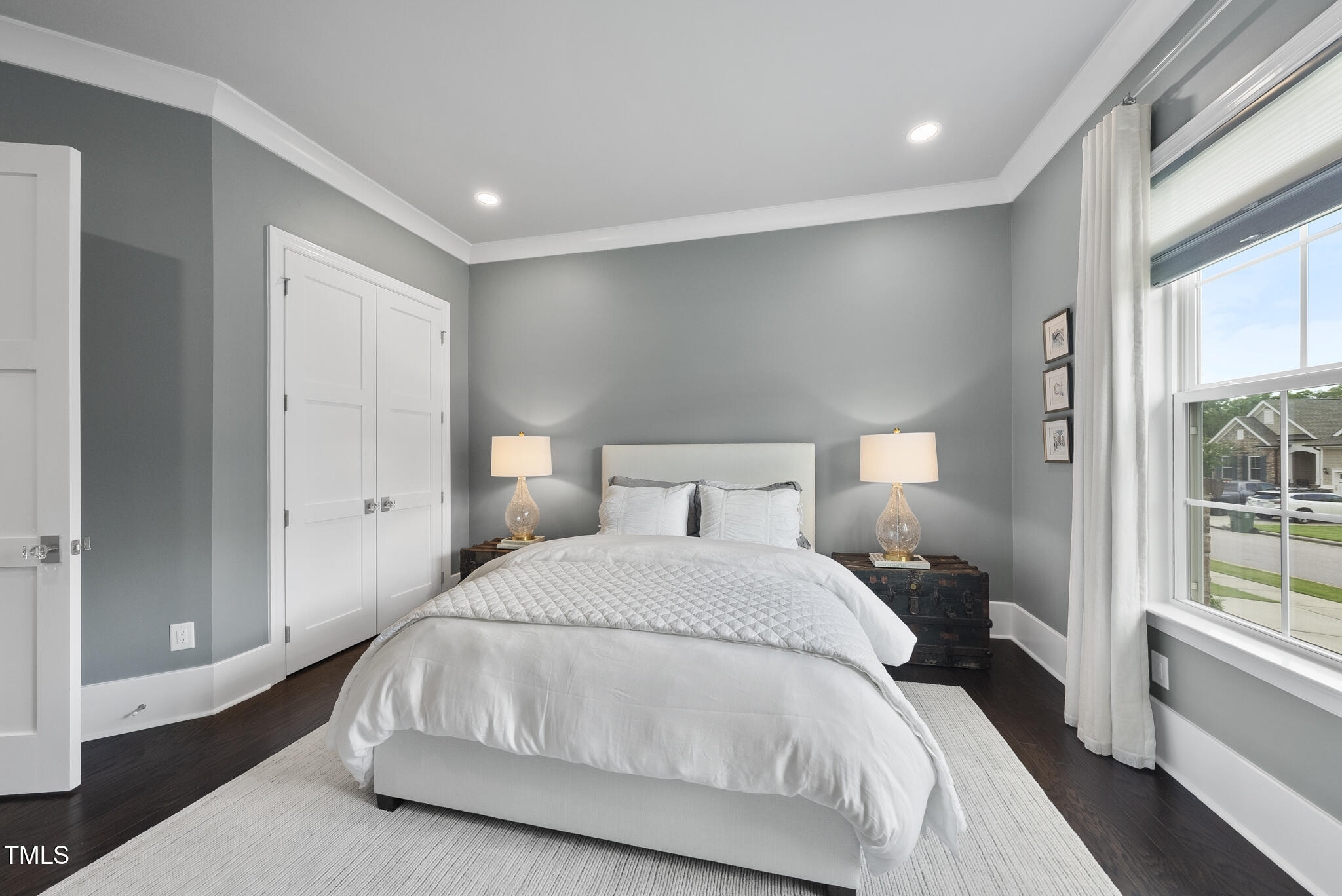 129 Damsire Way Cary, NC 27513 - Photo 22 of 33 a bedroom with a bed and a large window