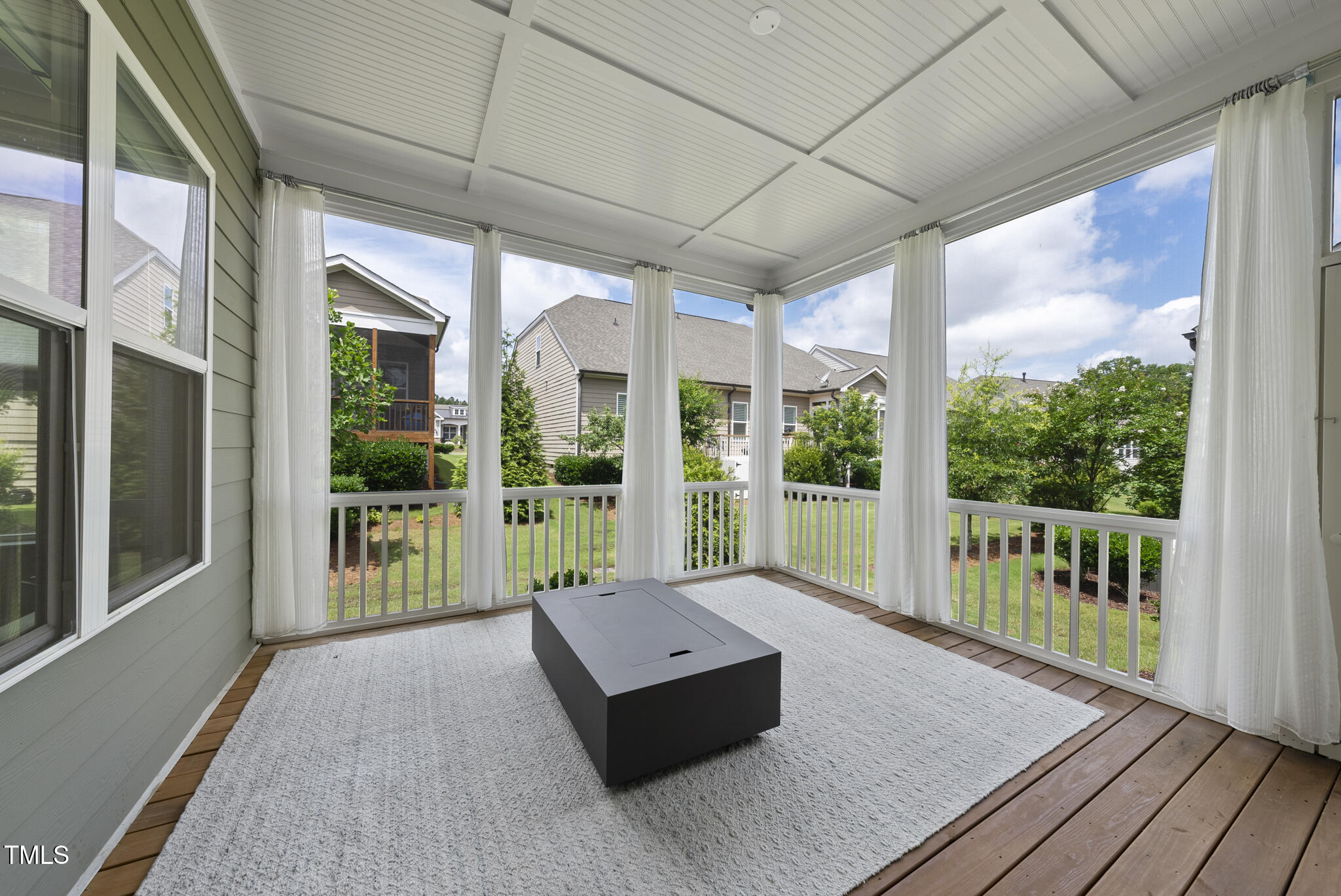 129 Damsire Way Cary, NC 27513 - Photo 32 of 33 a living room with hardwood floor and large windows