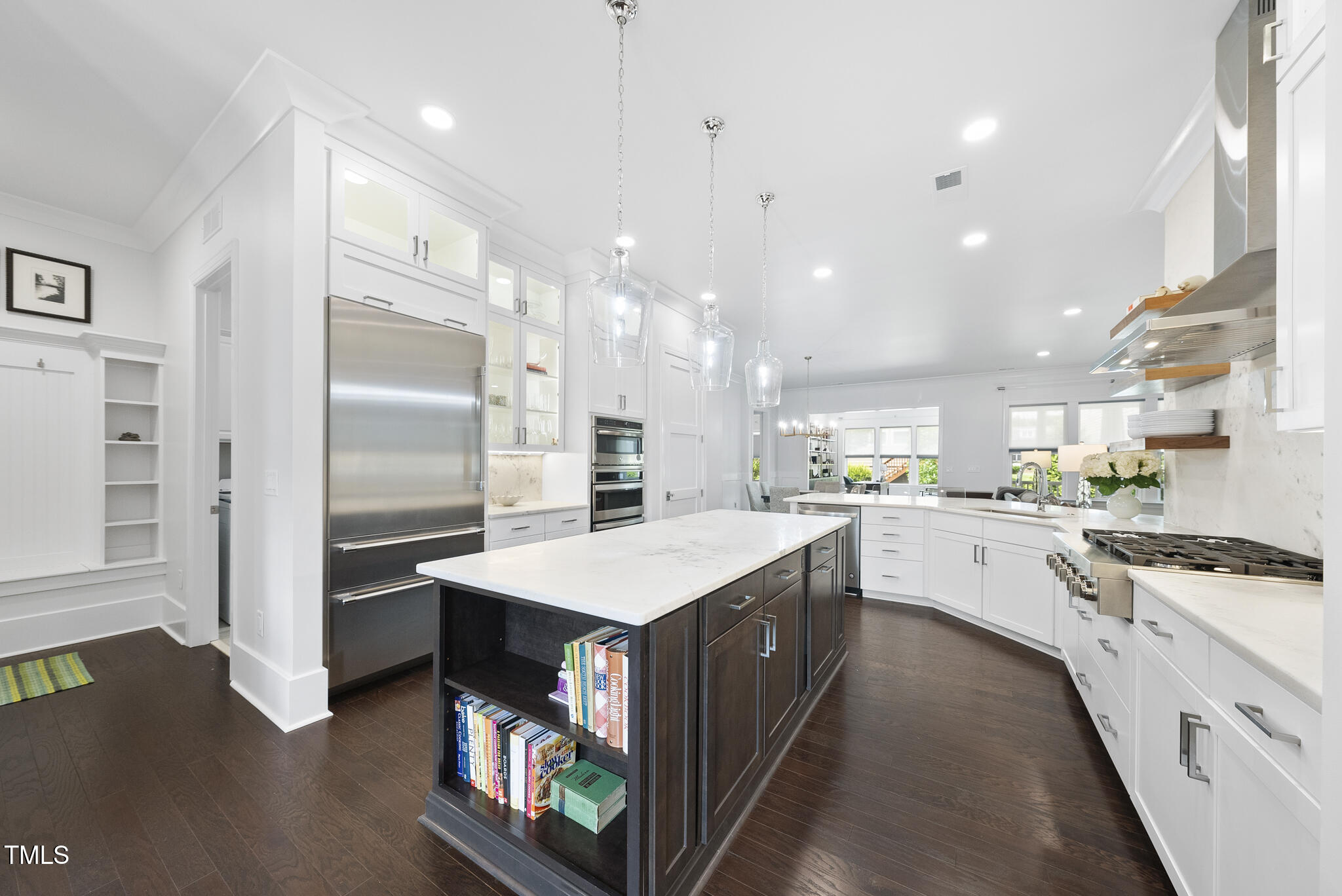 129 Damsire Way Cary, NC 27513 - Photo 5 of 33 a kitchen with a sink refrigerator and microwave