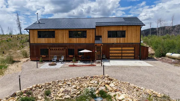 a front view of a house with parking