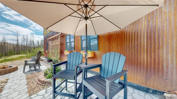 a patio view with a seating space