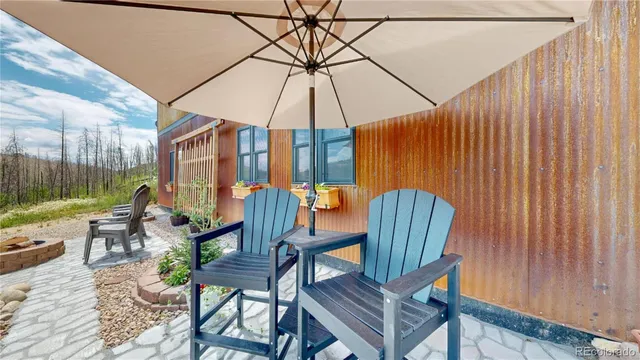 a patio view with a seating space