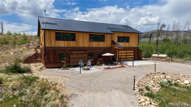 a front view of a house with patio