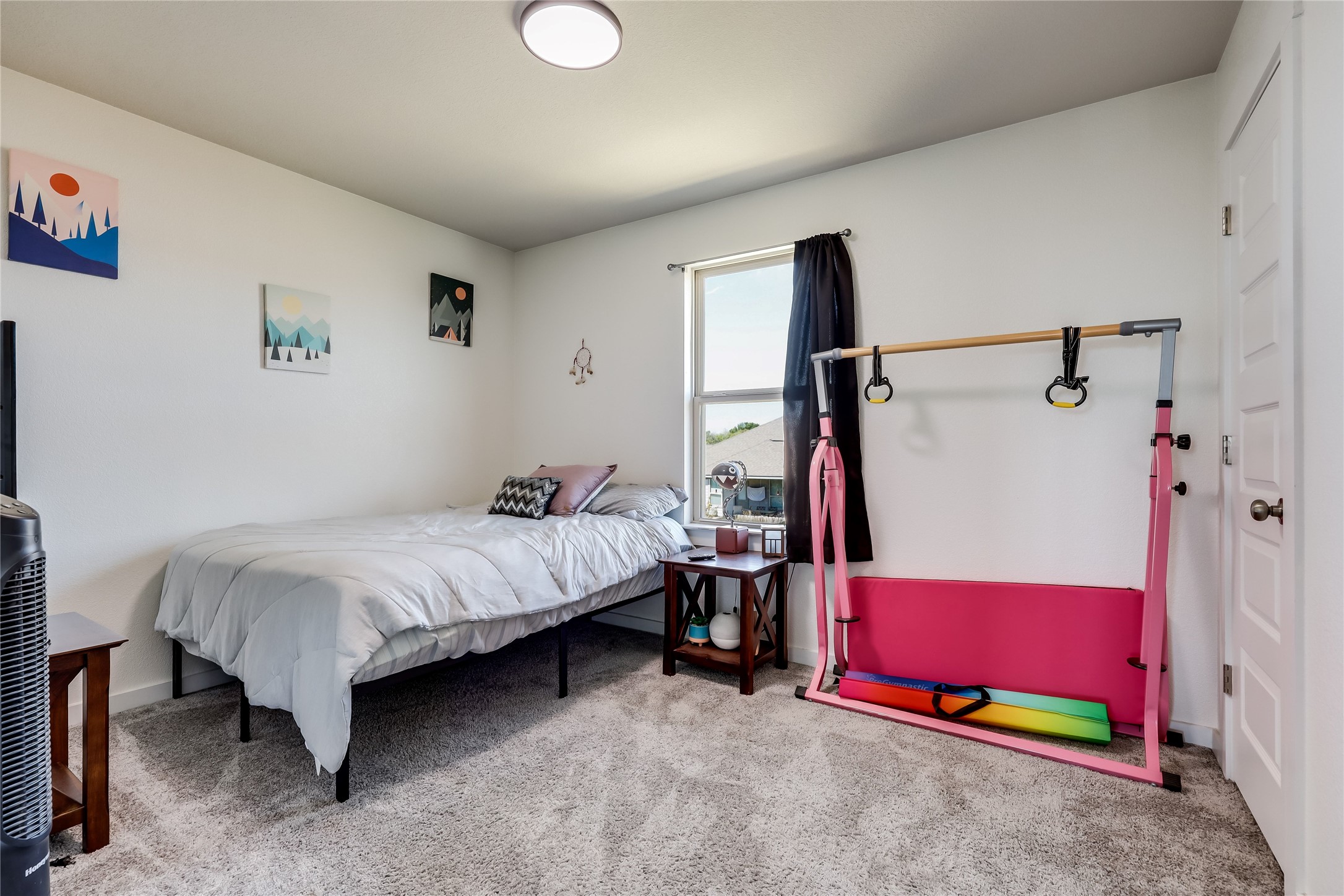249 Trellis Boulevard Leander, TX 78641 - Photo 14 of 18 a bed room with a bed and a chair