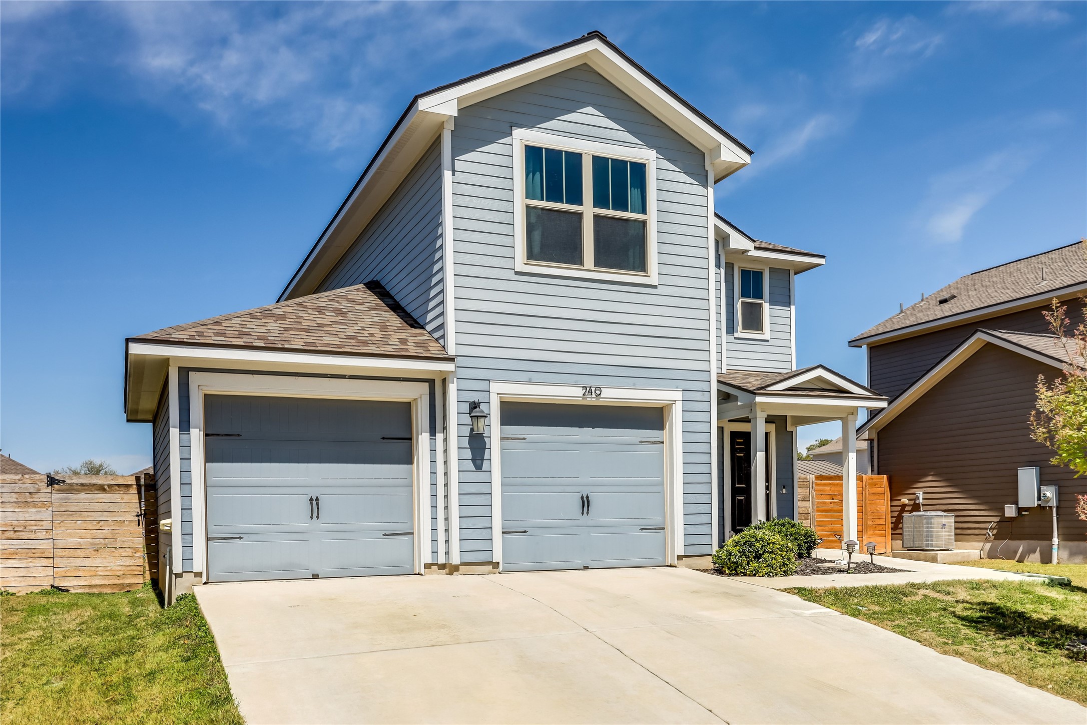 249 Trellis Boulevard Leander, TX 78641 - Photo 2 of 18 a front view of a house with a yard