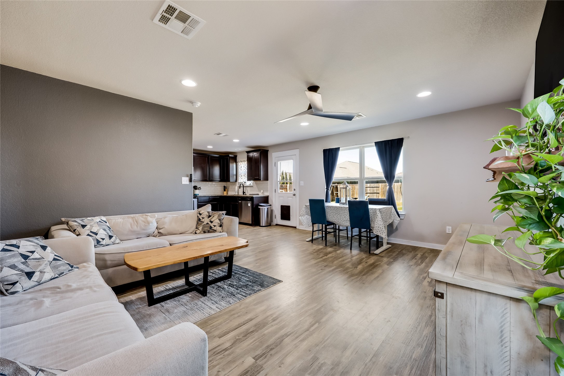 249 Trellis Boulevard Leander, TX 78641 - Photo 4 of 18 a living room with furniture and flowers
