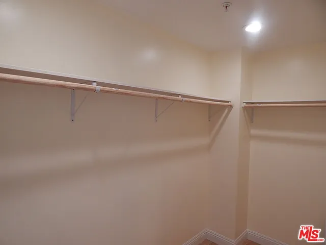 a view of a room with racks on the wall