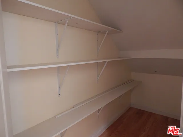 a view of an empty walk in closet