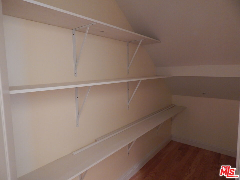 2018 Hillcrest Drive Los Angeles, CA 90016 - Photo 18 of 19 a view of an empty walk in closet