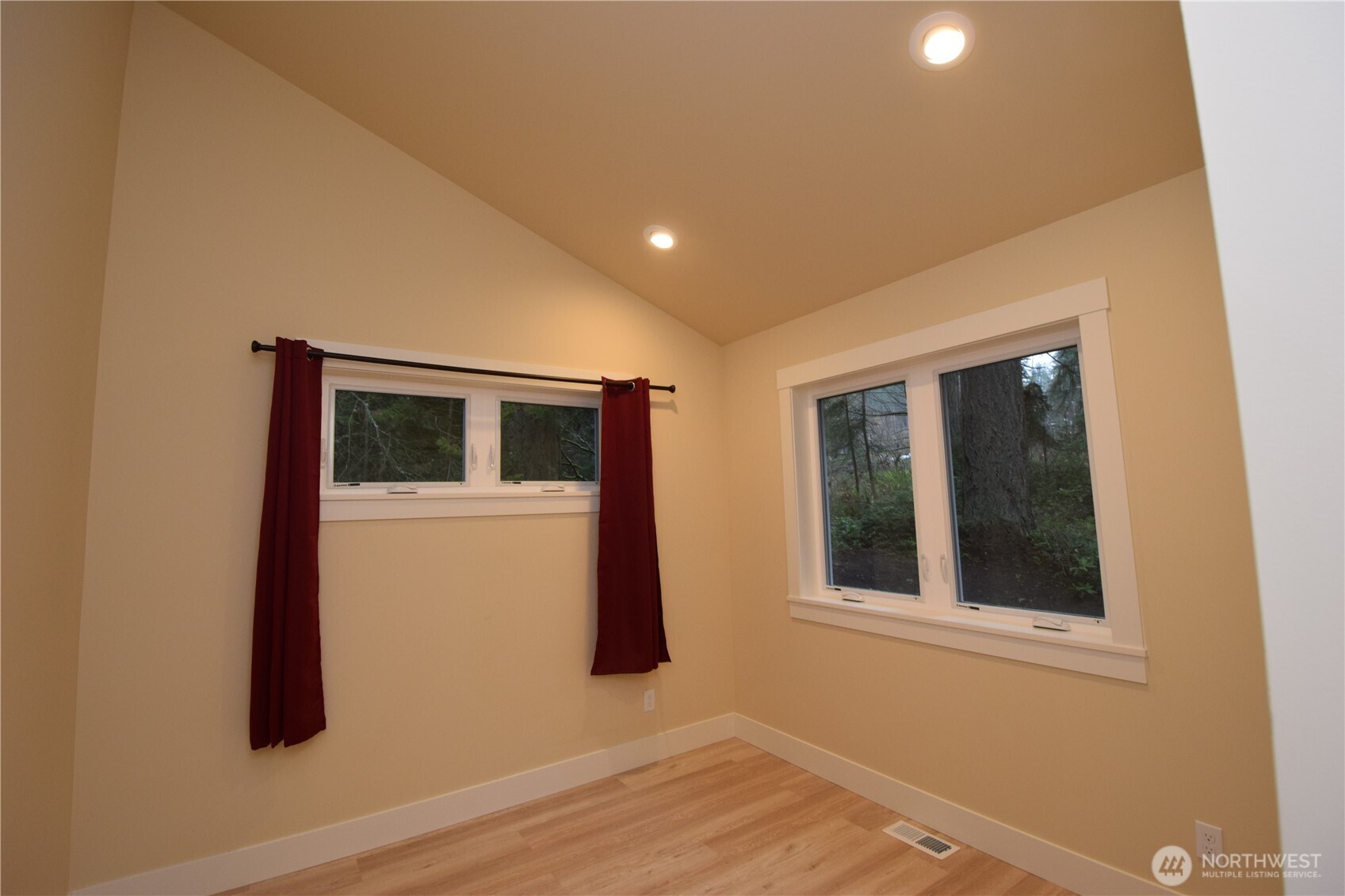 15915 Nesika Bay Road Northeast Poulsbo, WA 98370 - Photo 19 of 40 a view of house and front door