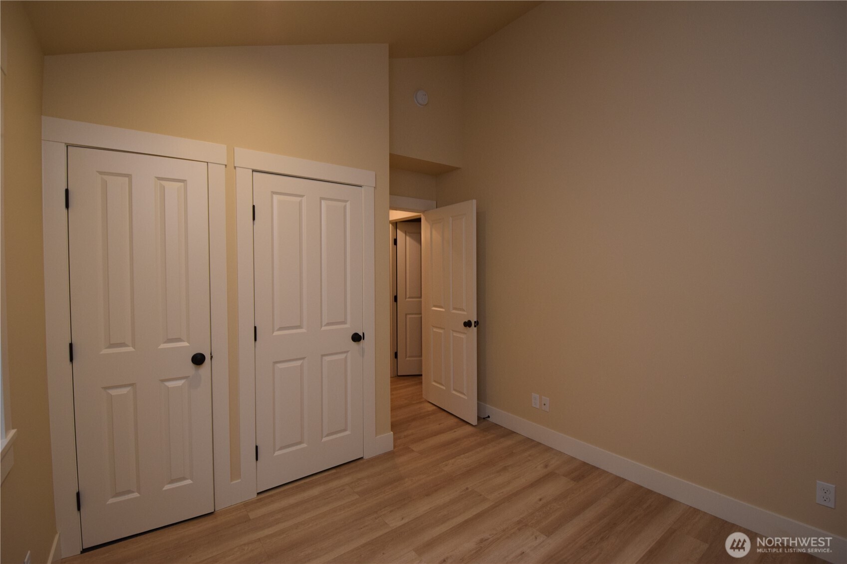 15915 Nesika Bay Road Northeast Poulsbo, WA 98370 - Photo 20 of 40 a view of an empty room