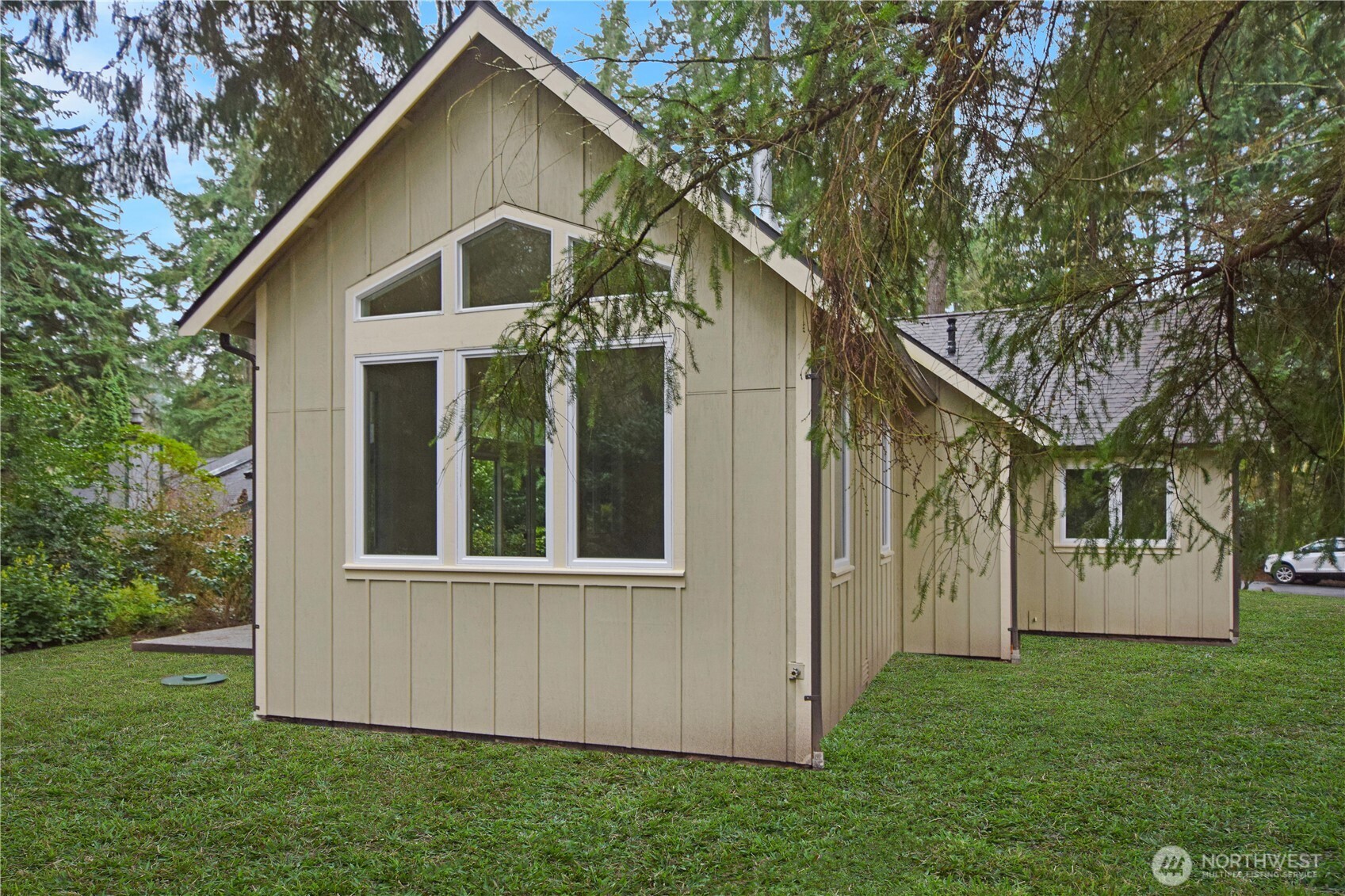 15915 Nesika Bay Road Northeast Poulsbo, WA 98370 - Photo 26 of 40 a view of a back yard of the house