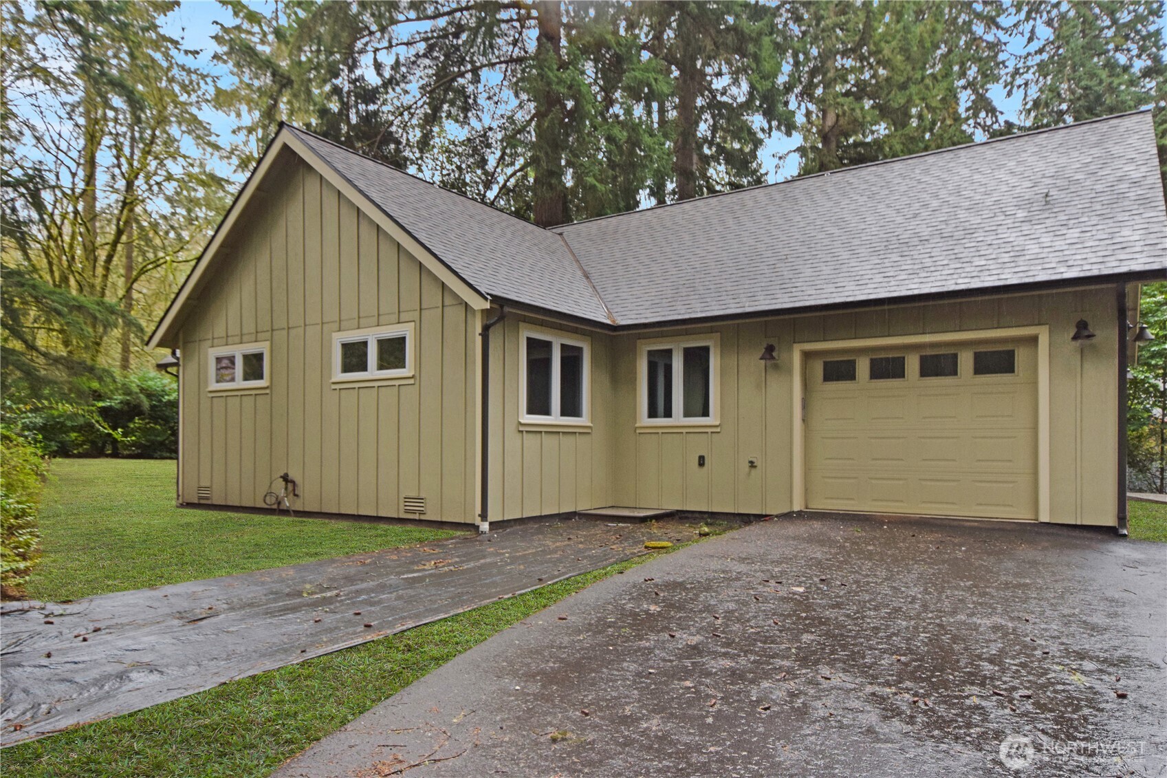 15915 Nesika Bay Road Northeast Poulsbo, WA 98370 - Photo 27 of 40 a view of front house with yard
