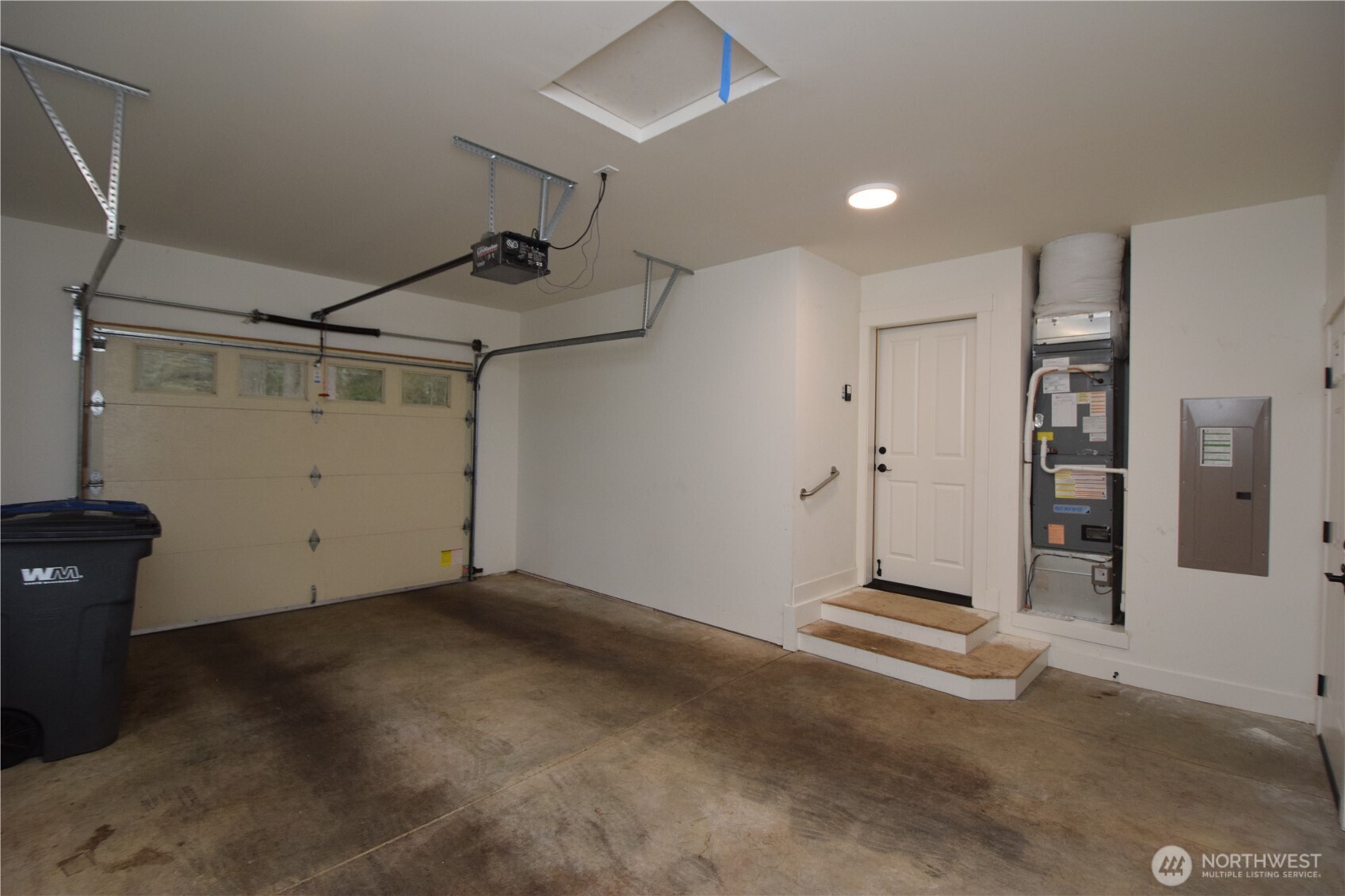 15915 Nesika Bay Road Northeast Poulsbo, WA 98370 - Photo 31 of 40 a view of a garage