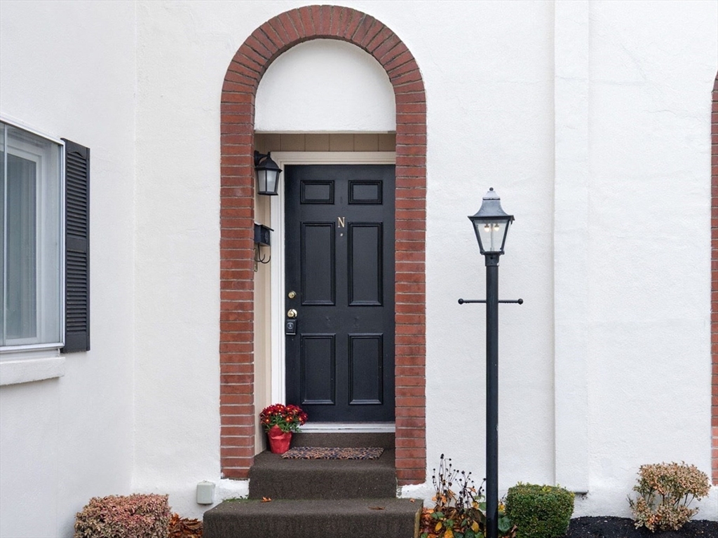 1 Charles Street, Unit N Reading, MA 01867 - Photo 1 of 17 a view of front door of house