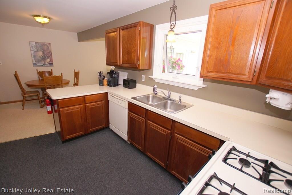 1748 Peavy Road Howell, MI 48843 - Photo 3 of 22 Kitchen Opens into the Dining Area