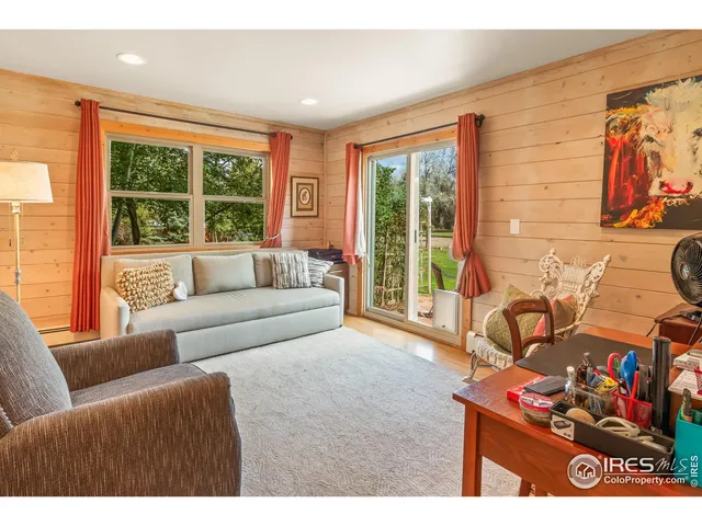 a kitchen with stainless steel appliances granite countertop a stove oven and a refrigerator with wooden cabinets