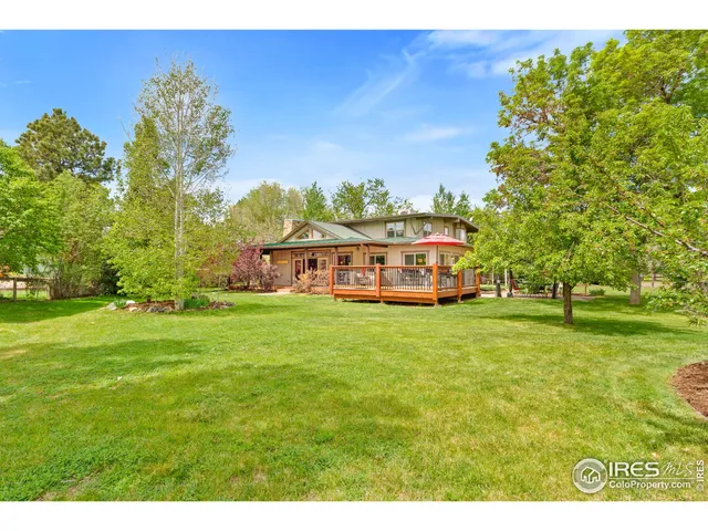a view of a house with a big yard