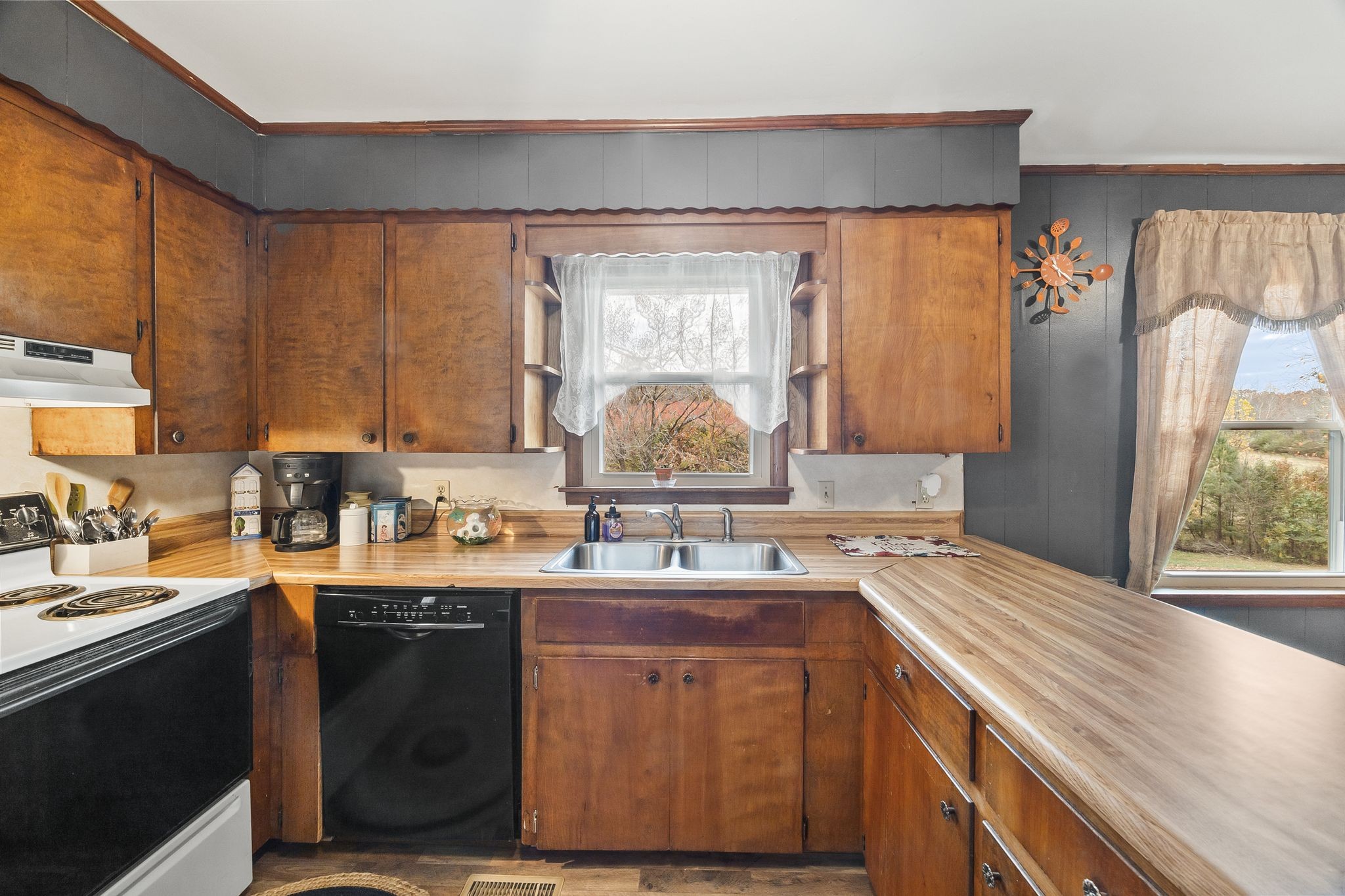 948 North Brace Road Summertown, TN 38483 - Photo 13 of 59 a kitchen with a sink stove and cabinets