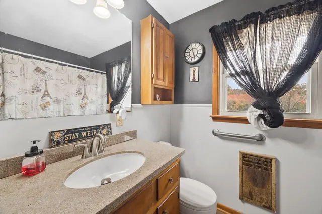 a bedroom with a bed and a walk in closet