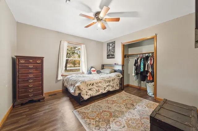 a pathway of a house with a yard