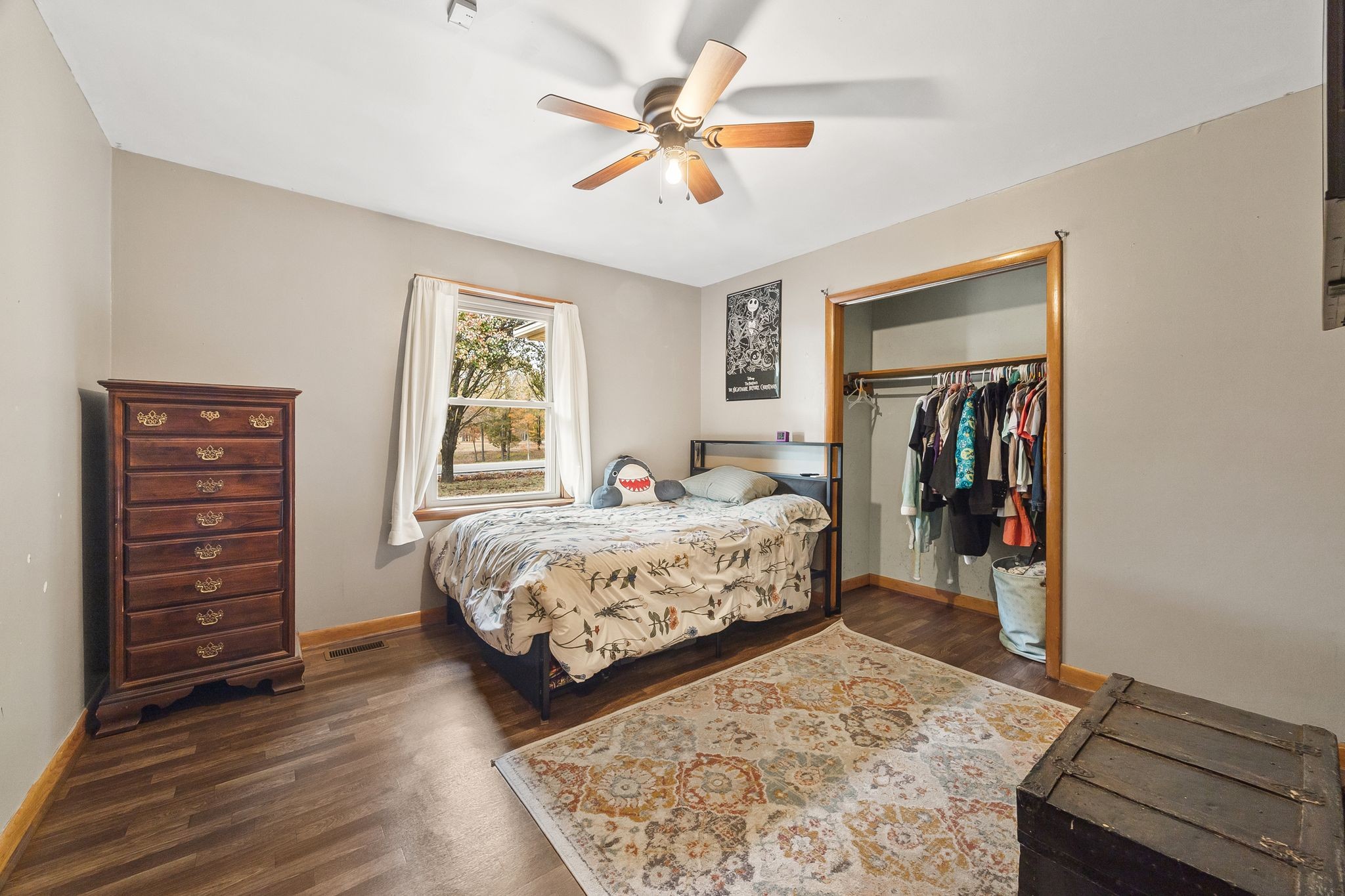 948 North Brace Road Summertown, TN 38483 - Photo 24 of 59 a bedroom with a bed and a walk in closet