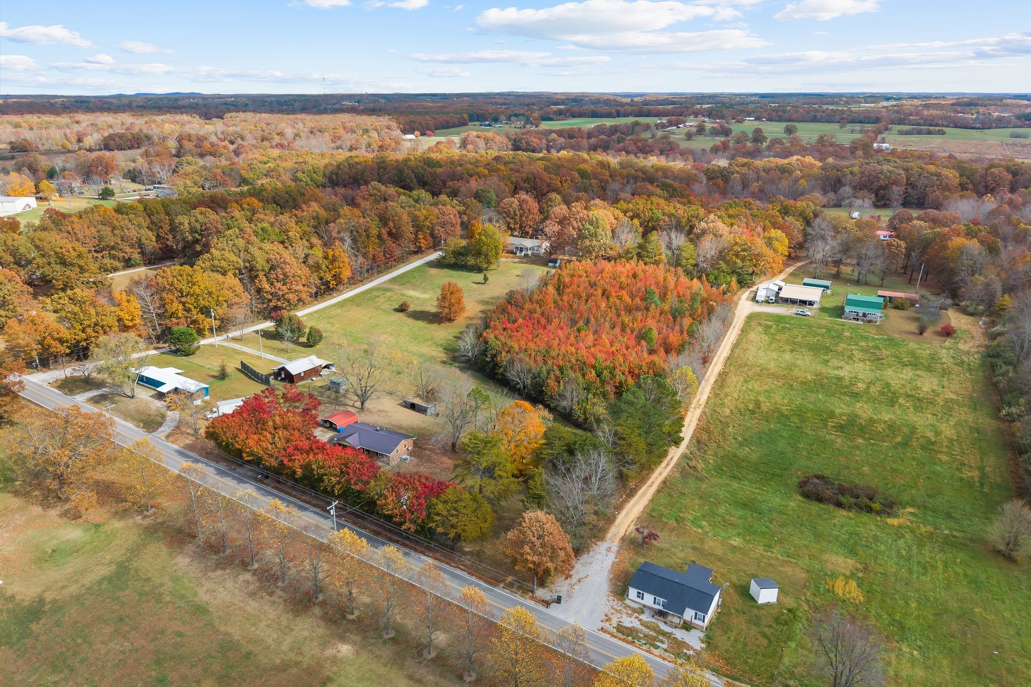 948 North Brace Road Summertown, TN 38483 - Photo 34 of 59 an aerial view of residential houses with outdoor space